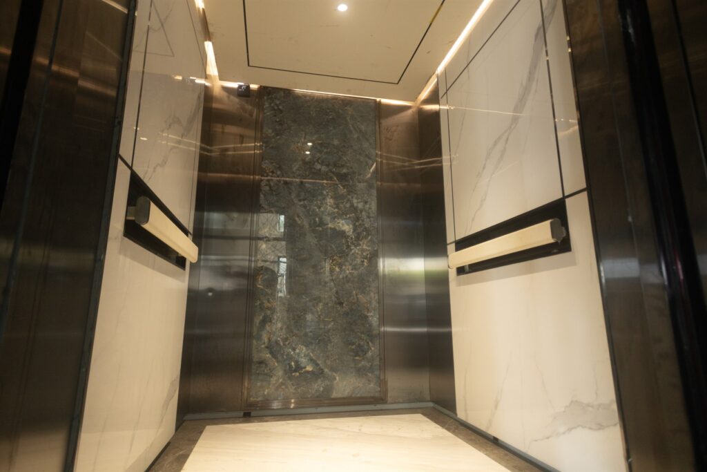 Brum Height 5: Interior of the elevator cabin with handrails